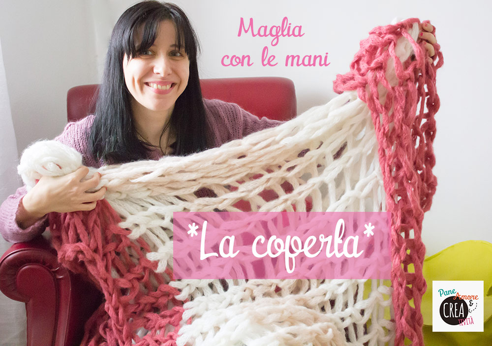 coperta-a-maglia-con-le-mani-web